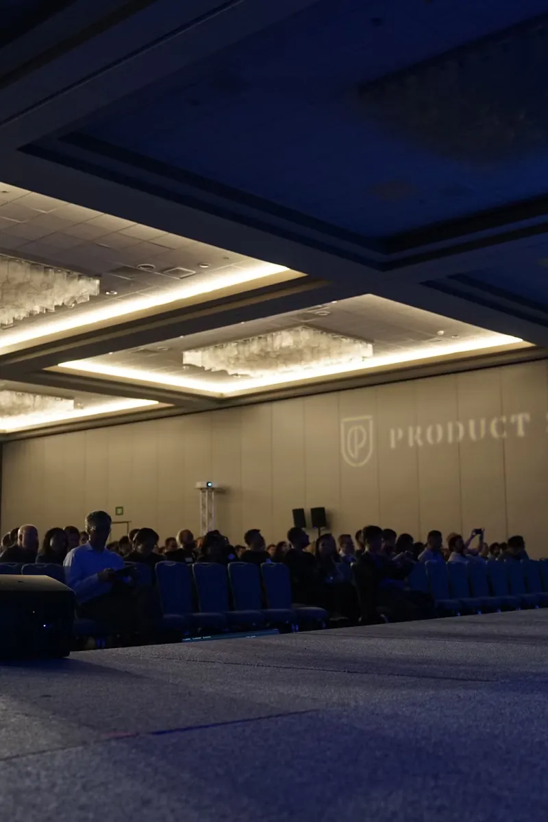 Critique wall covered in wireframes and typography studies